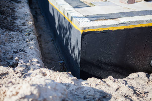 Professional Emergency Waterproofing technician working in West Jefferson, OH